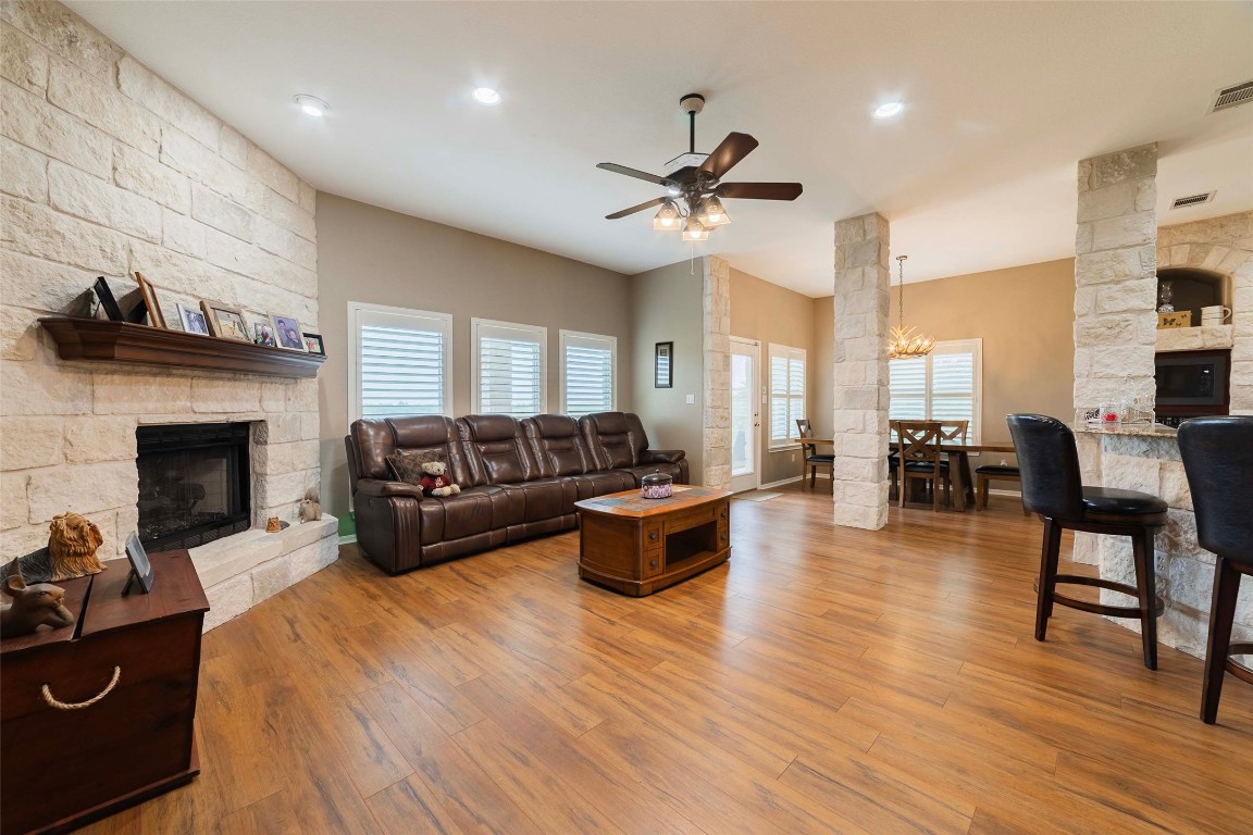 20145 Janak Road Coupland, TX 78615 - Photo 20 of 40 a living room with furniture and a fireplace