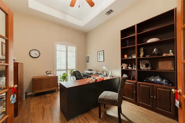a view of balcony with wooden floor