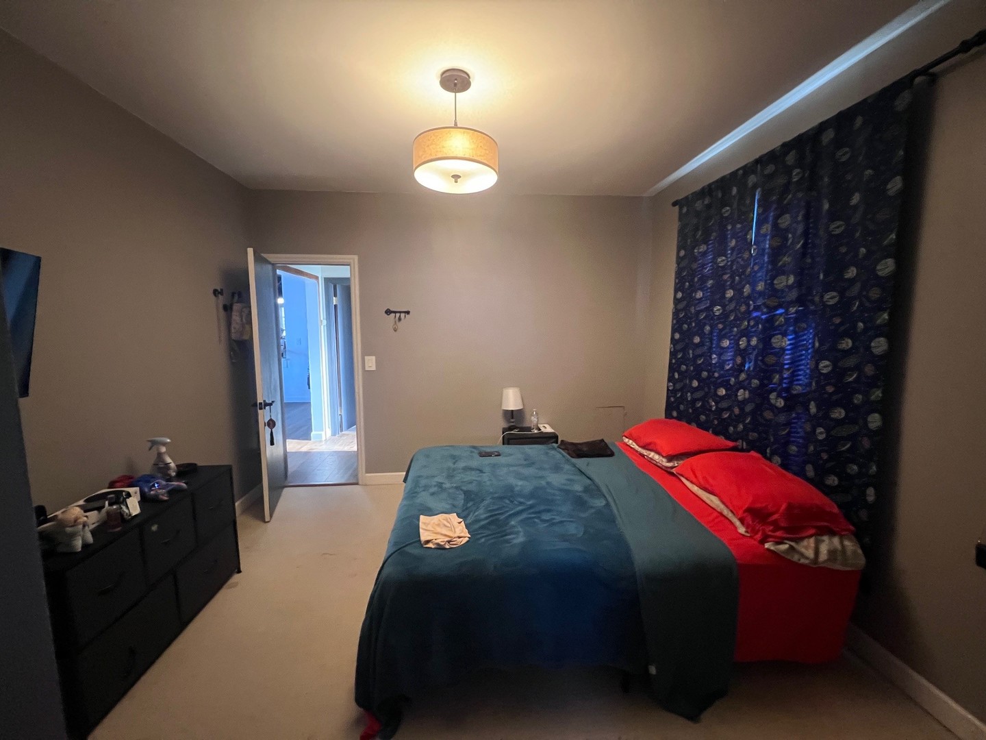 244 Indian Trail Lake In The Hills, IL 60156 - Photo 12 of 23 a bedroom with a bed and a lamp on the dresser