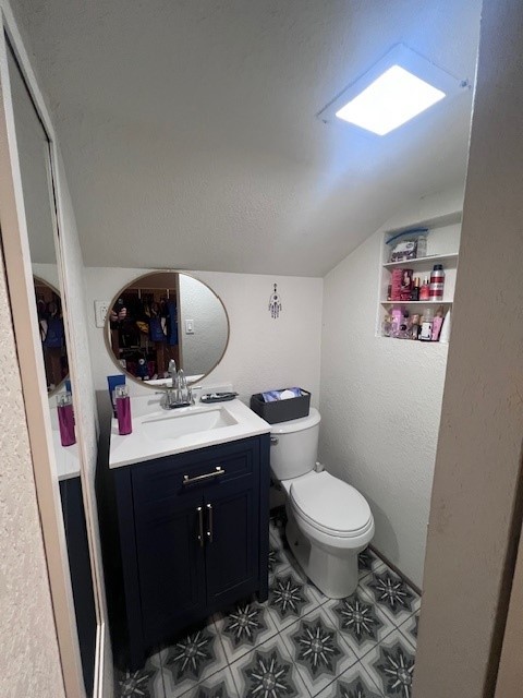 244 Indian Trail Lake In The Hills, IL 60156 - Photo 20 of 23 a bathroom with a toilet sink and mirror
