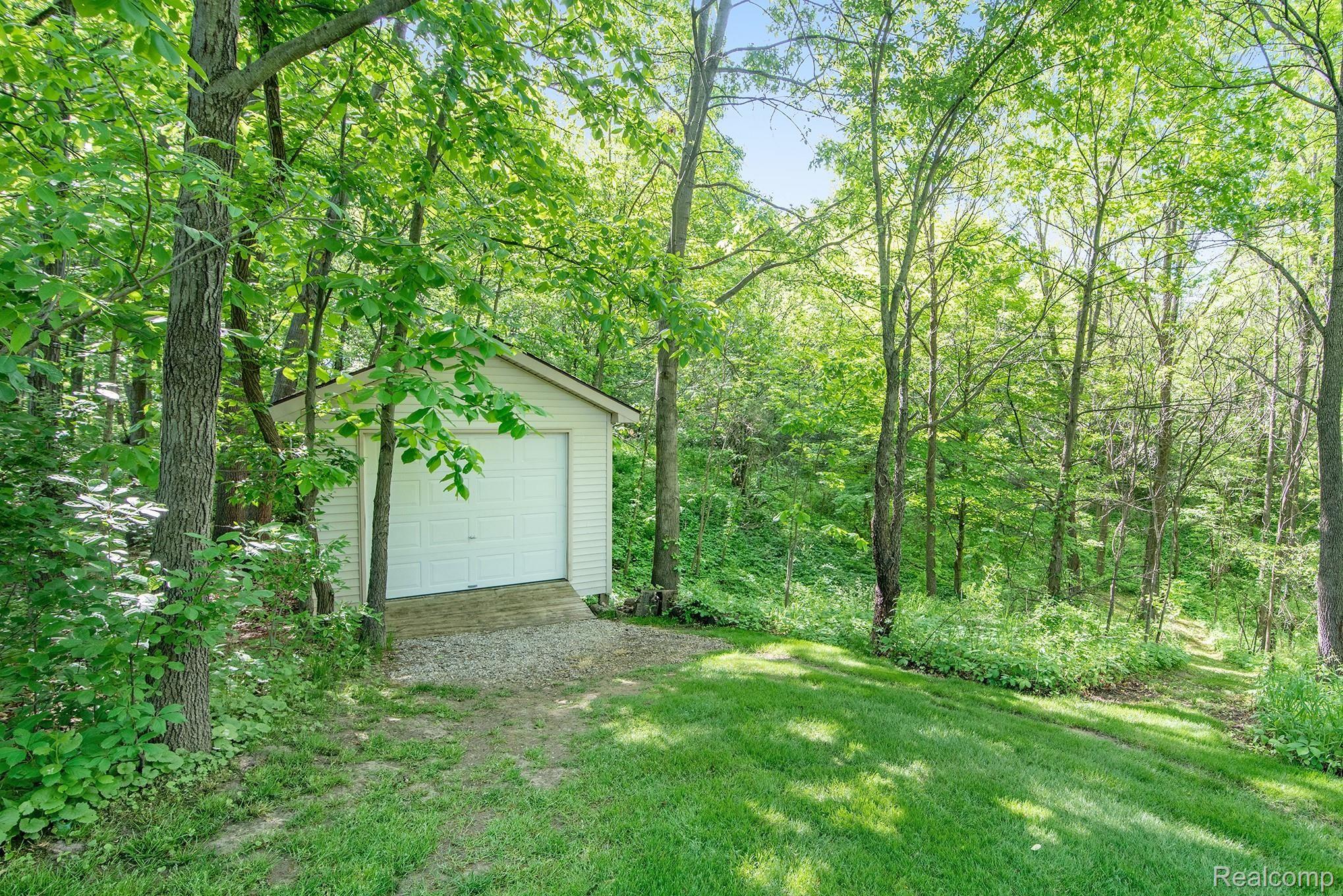 360 East Davisburg Road Holly, MI 48442 - Photo 24 of 30 Shed and view of your wooded oasis