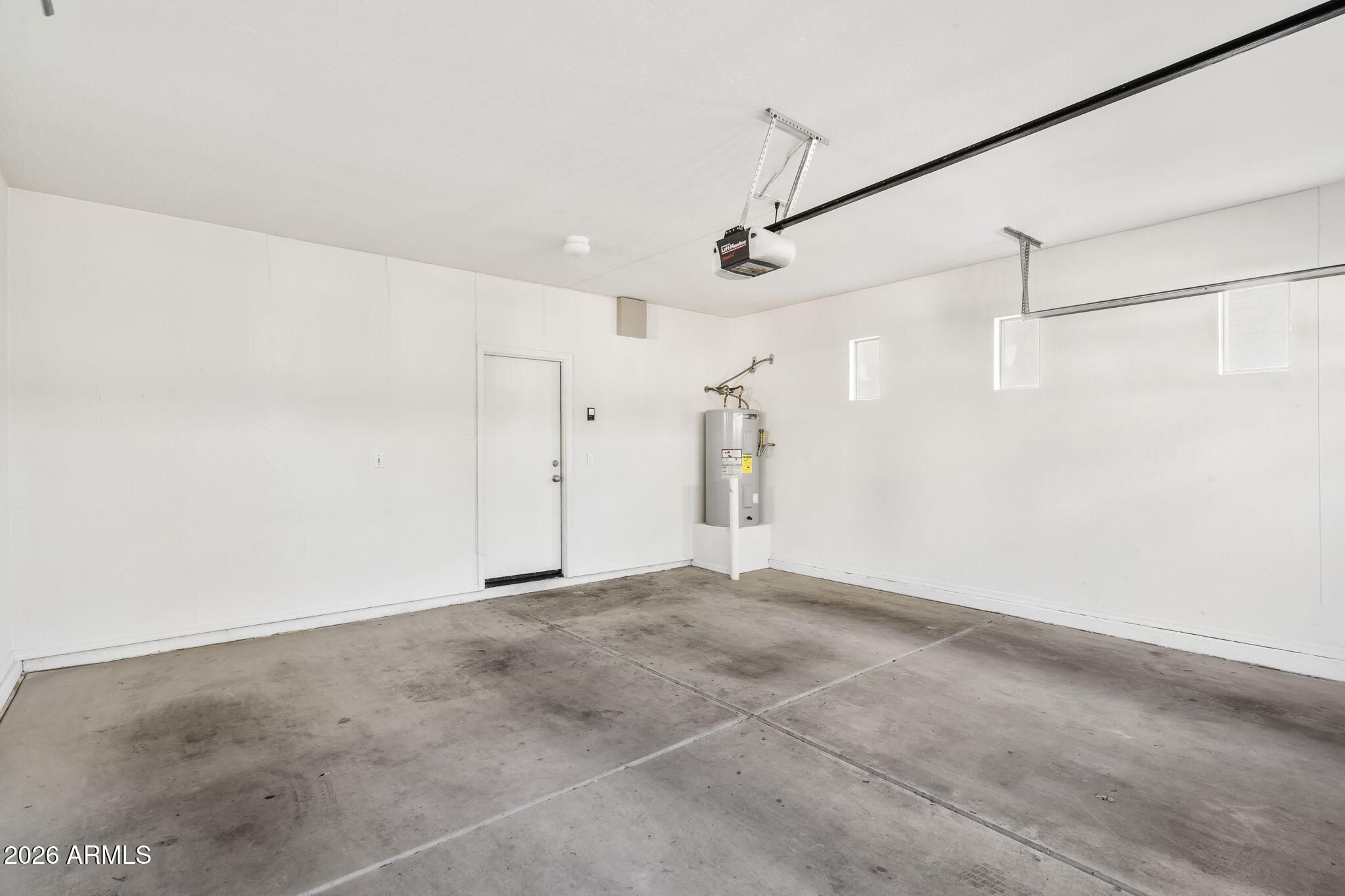 1332 East Dunbar Drive Phoenix, AZ 85042 - Photo 13 of 50 a view of a big room with carpet