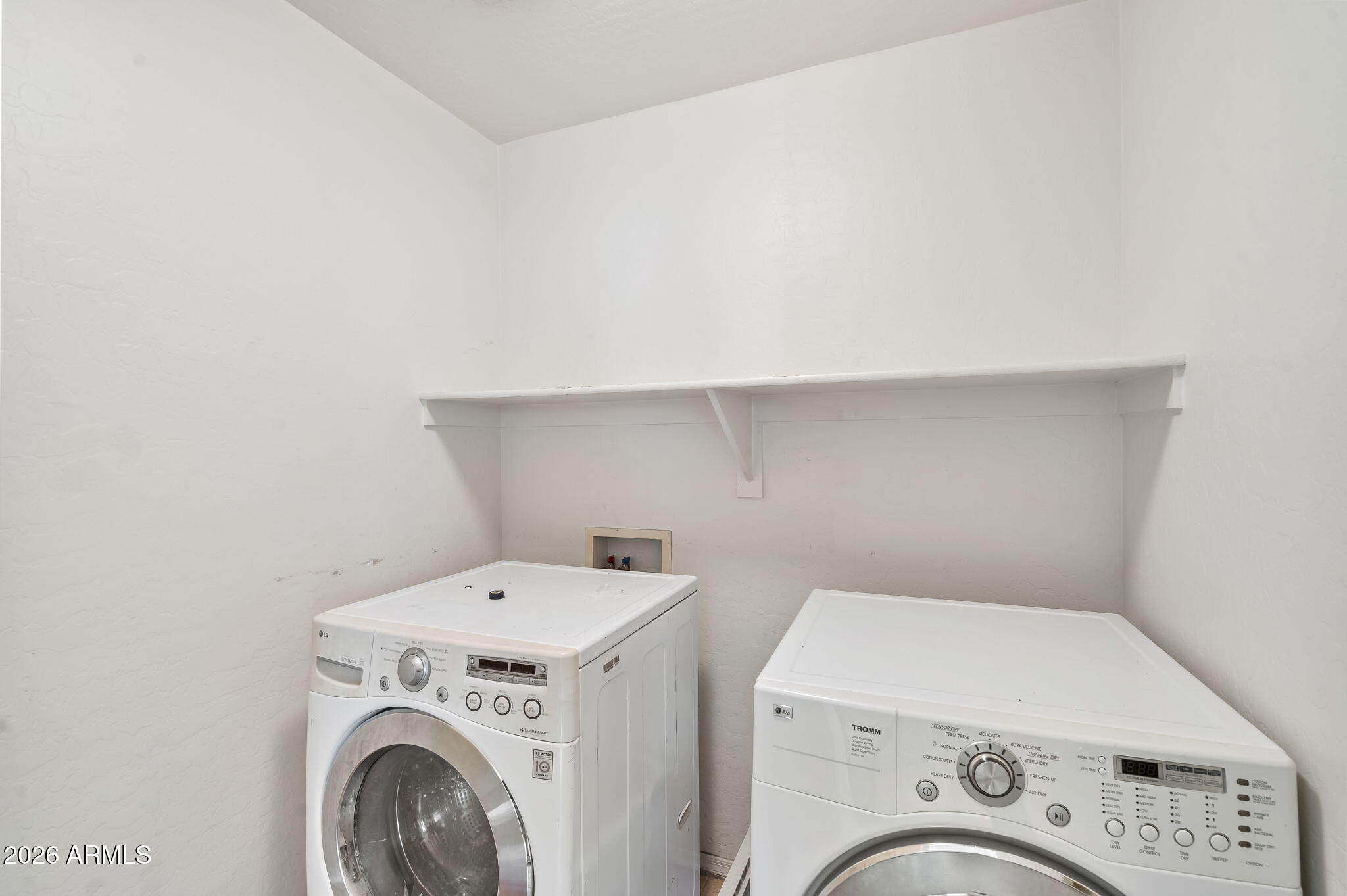 1332 East Dunbar Drive Phoenix, AZ 85042 - Photo 22 of 50 a utility room with dryer and washer