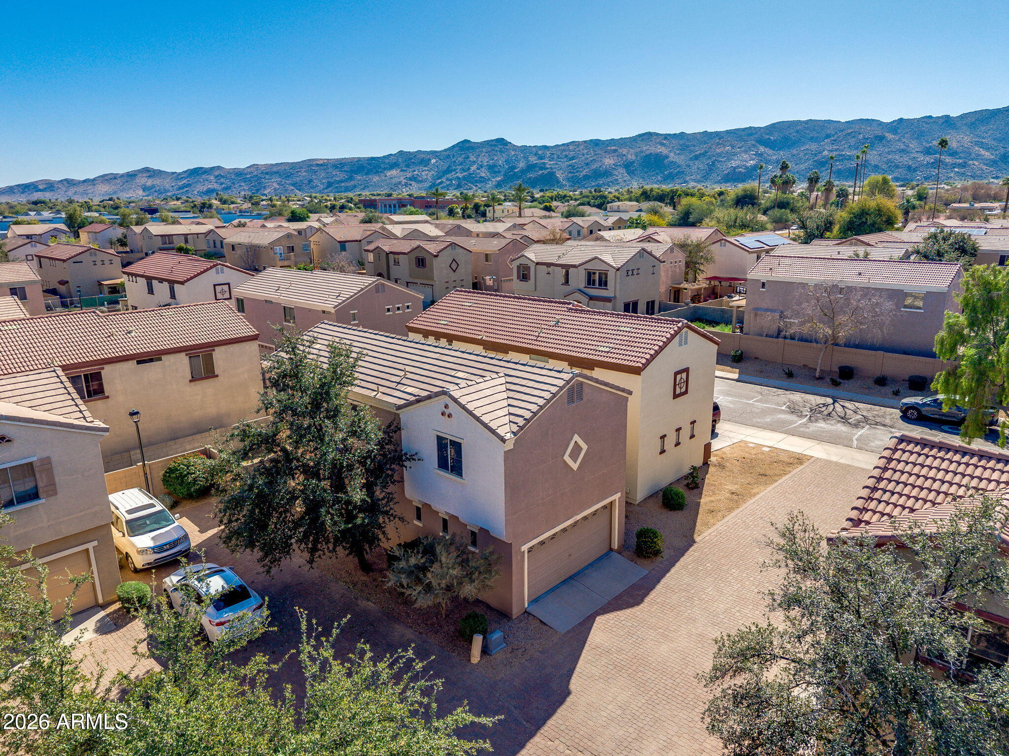 1332 East Dunbar Drive Phoenix, AZ 85042 - Photo 35 of 50 an aerial view of a house with a garden