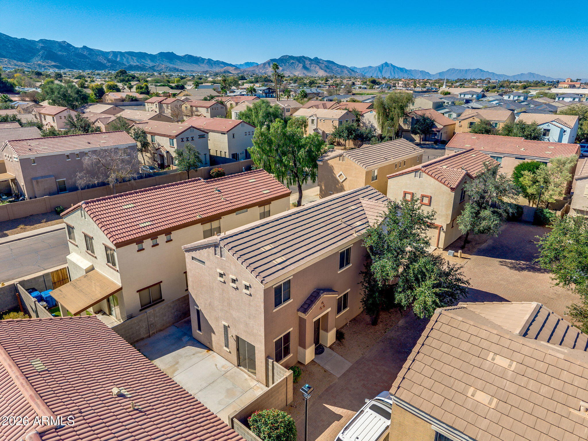 1332 East Dunbar Drive Phoenix, AZ 85042 - Photo 40 of 50 an aerial view of a house with a garden