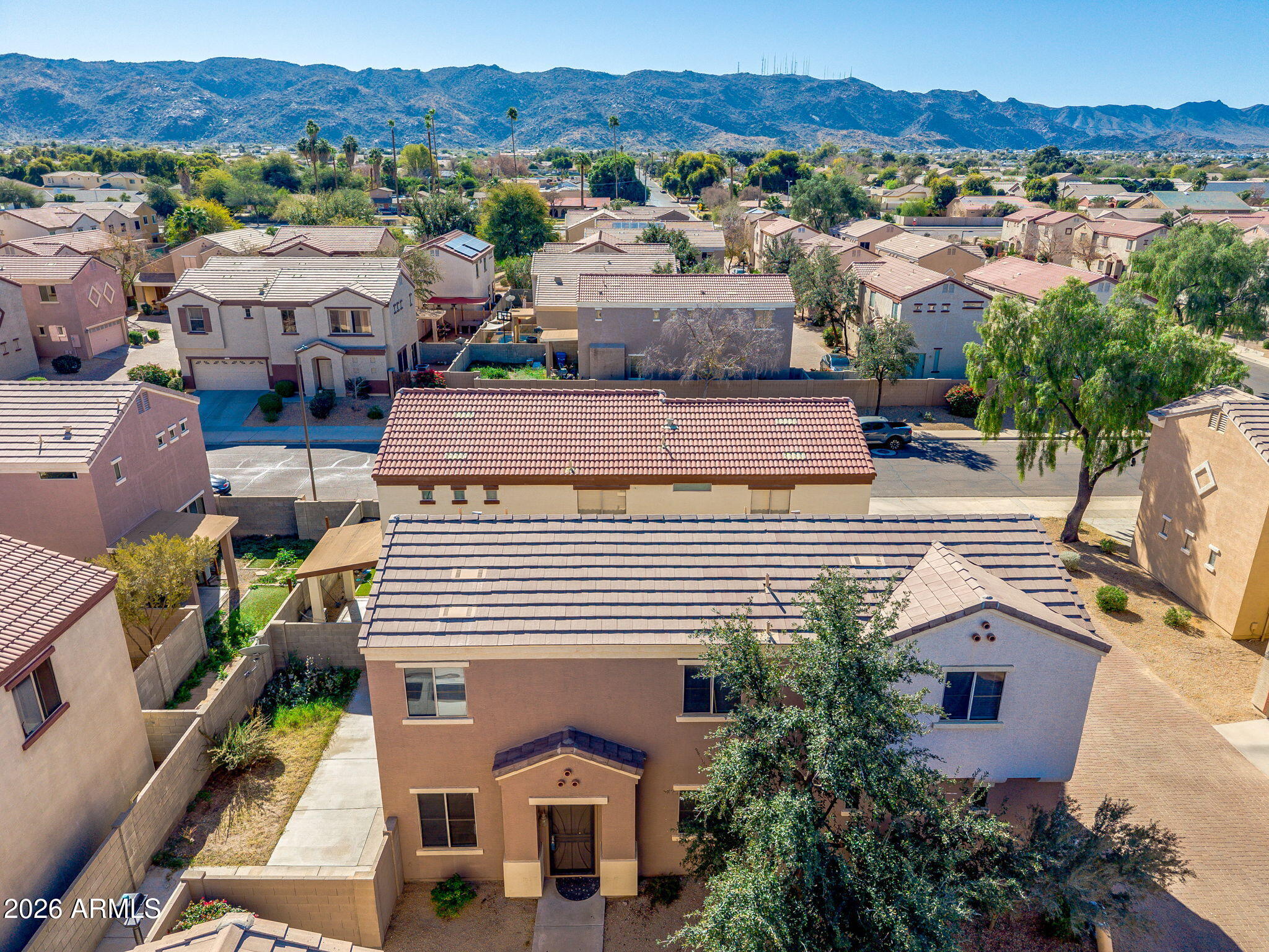1332 East Dunbar Drive Phoenix, AZ 85042 - Photo 41 of 50 an aerial view of a houses with a city street