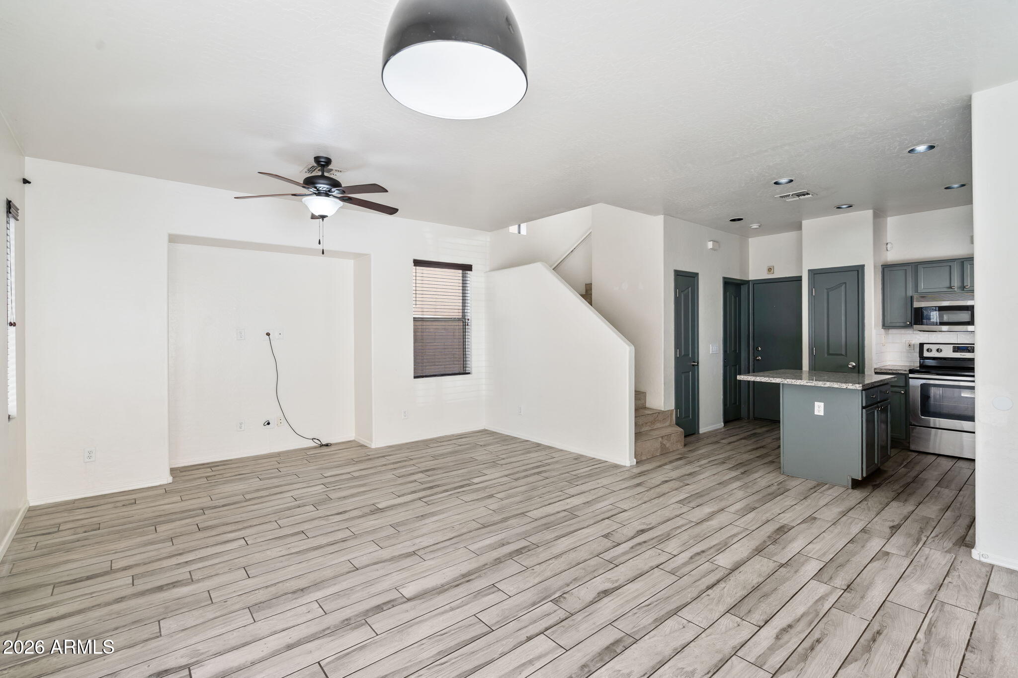 1332 East Dunbar Drive Phoenix, AZ 85042 - Photo 50 of 50 a view of a room with wooden floor