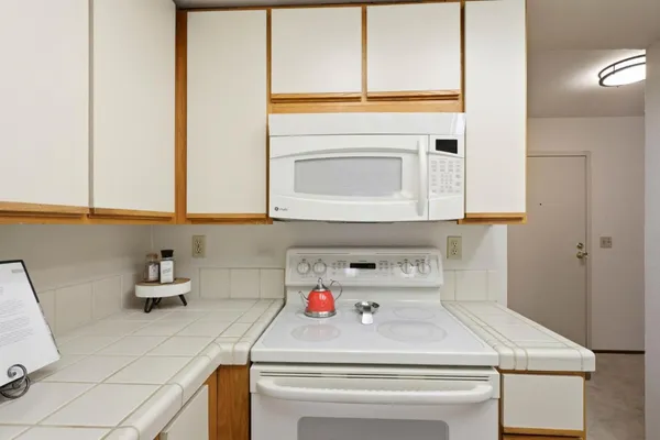 a bathroom with a sink and a washing machine