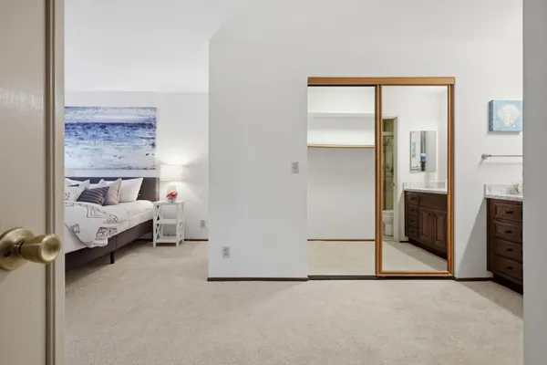a bed room with a bed and a fireplace