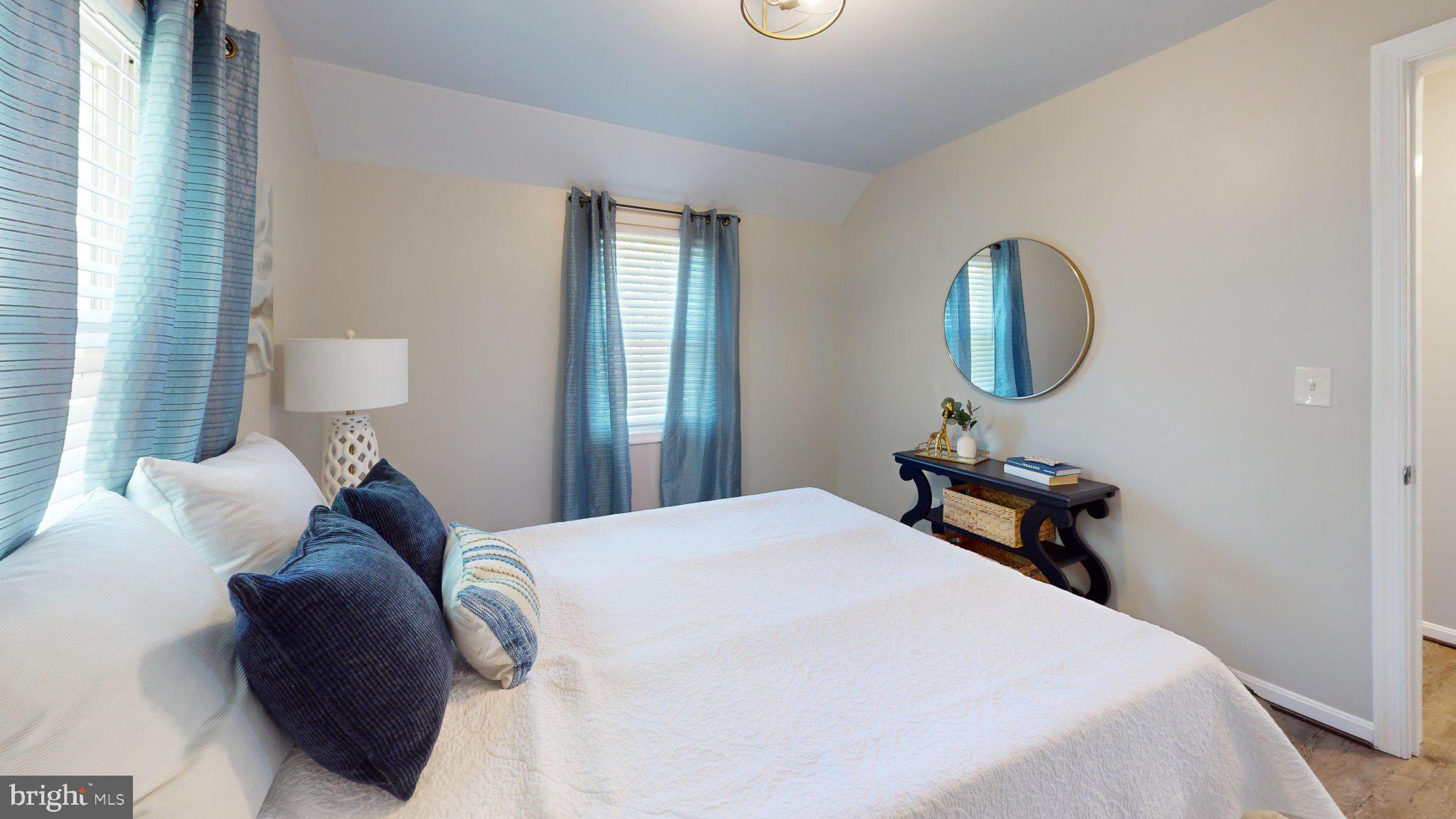 7711 Fairgreen Road Dundalk, MD 21222 - Photo 8 of 18 Serene bedroom with natural light.
