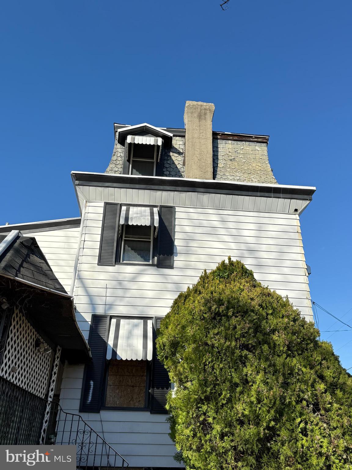 112 Ridge Avenue Darby, PA 19023 - Photo 3 of 4 a front view of a house with balcony