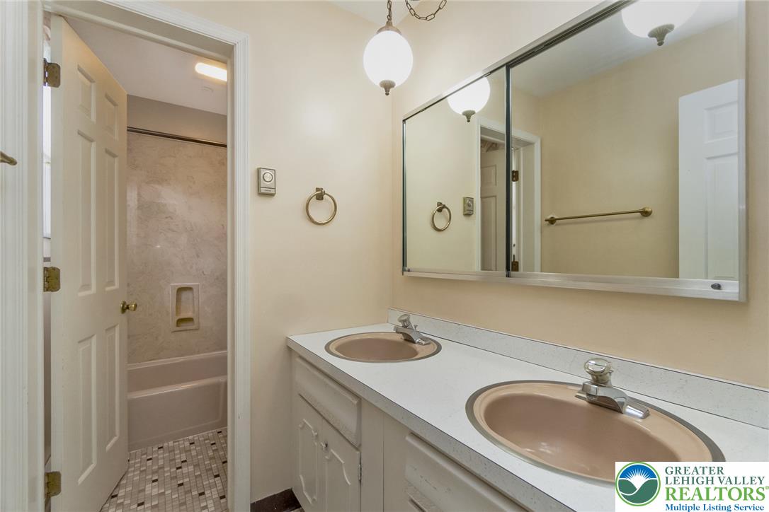 268 Apollo Drive Bethlehem, PA 18017 - Photo 33 of 56 Double vanity sinks and tiled floors define this functional and efficient full bathroom.