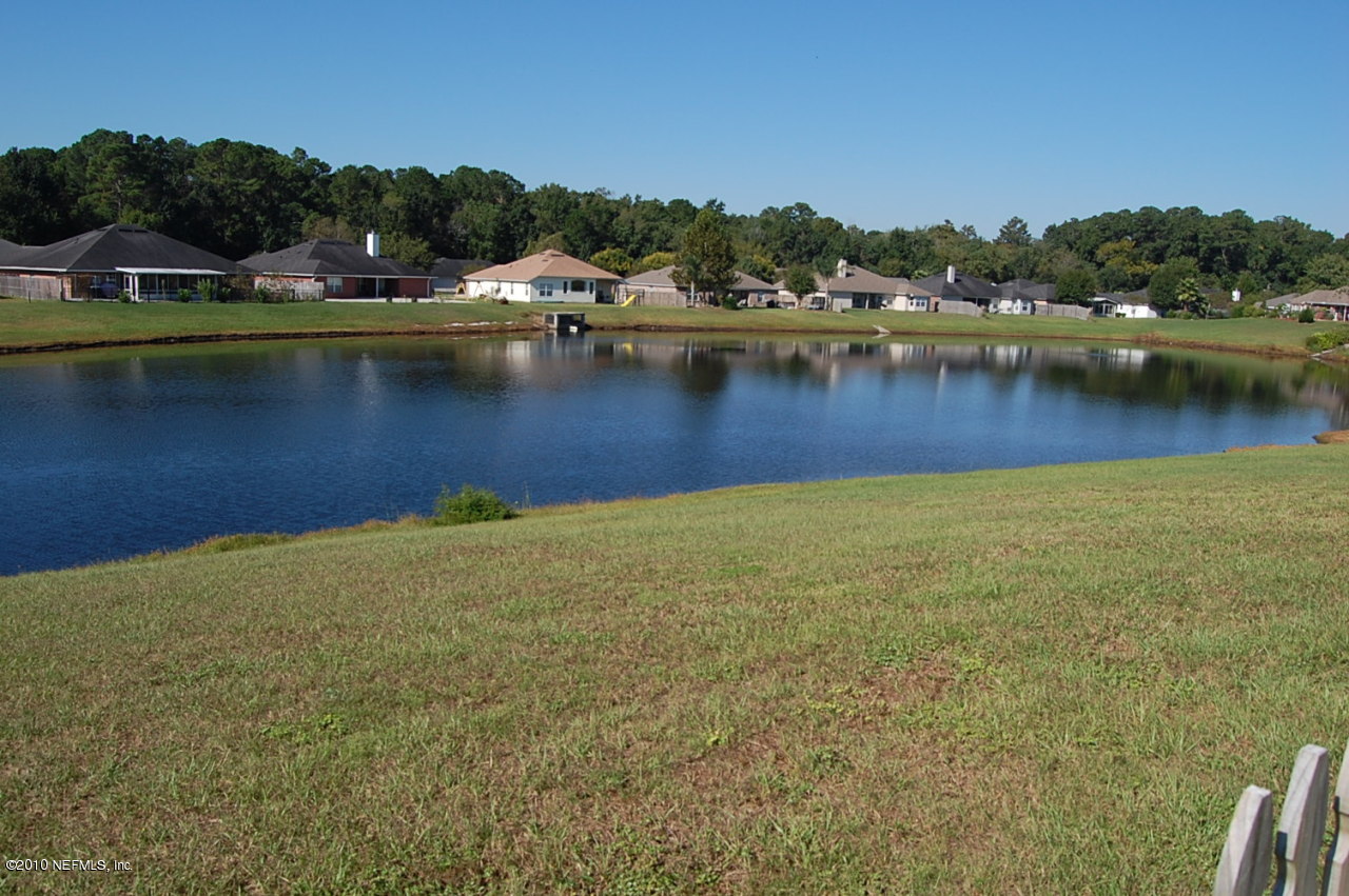 2444 Paris Mill Road Jacksonville, FL 32221 - Photo 17 of 19 a view of a lake with houses in outdoor space
