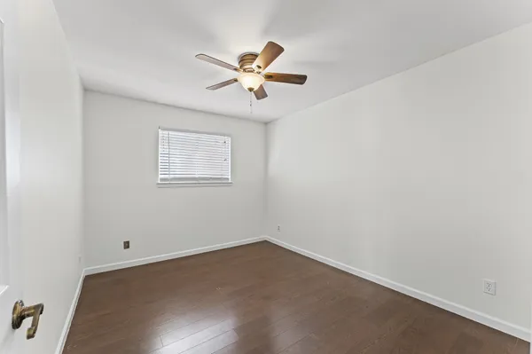 a view of a room with a fan