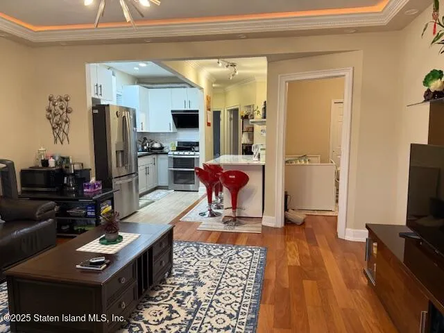 a view of dinning table and chairs in a kitchen