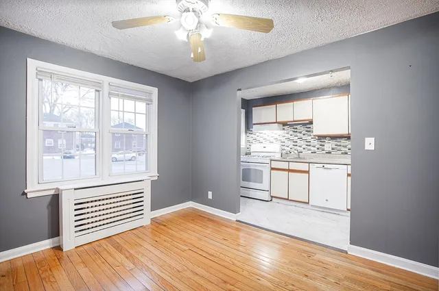 a view of a room with a large window