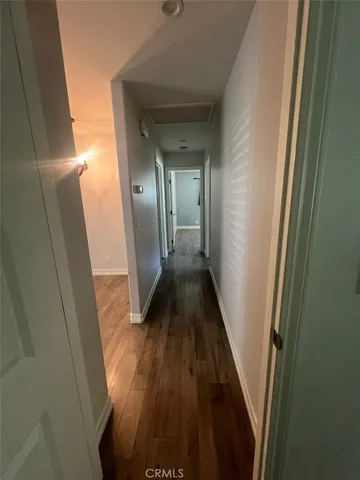 a view of a hallway from a hallway