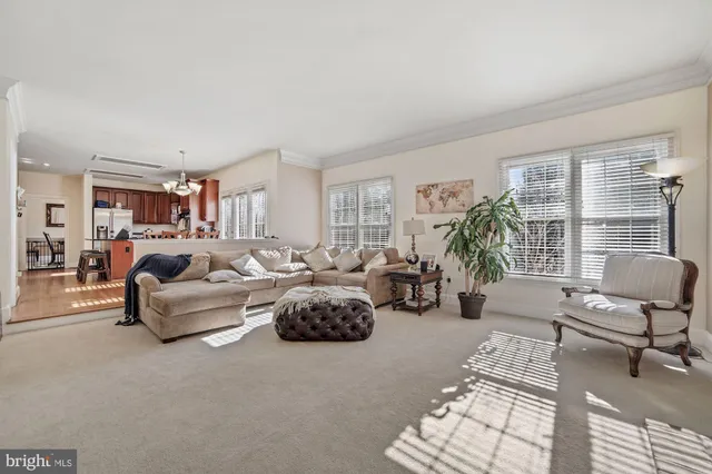 a bathroom with a sink mirror and toilet