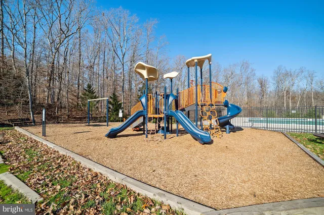 a view of multiple houses with a street
