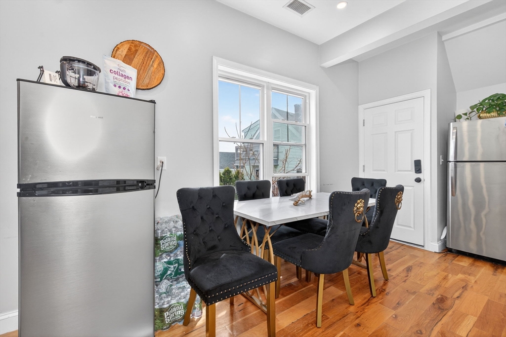 1684 North Shore Road Revere, MA 02151 - Photo 22 of 39 a view of a dining room with furniture window and outside view