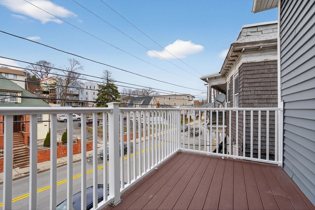1684 North Shore Road Revere, MA 02151 - Photo 33 of 39 a view of a balcony with wooden floor