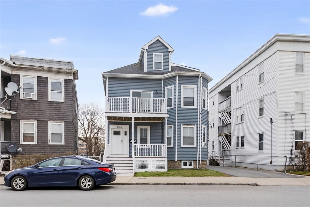 1684 North Shore Road Revere, MA 02151 - Photo 37 of 39 a car parked in front of a building