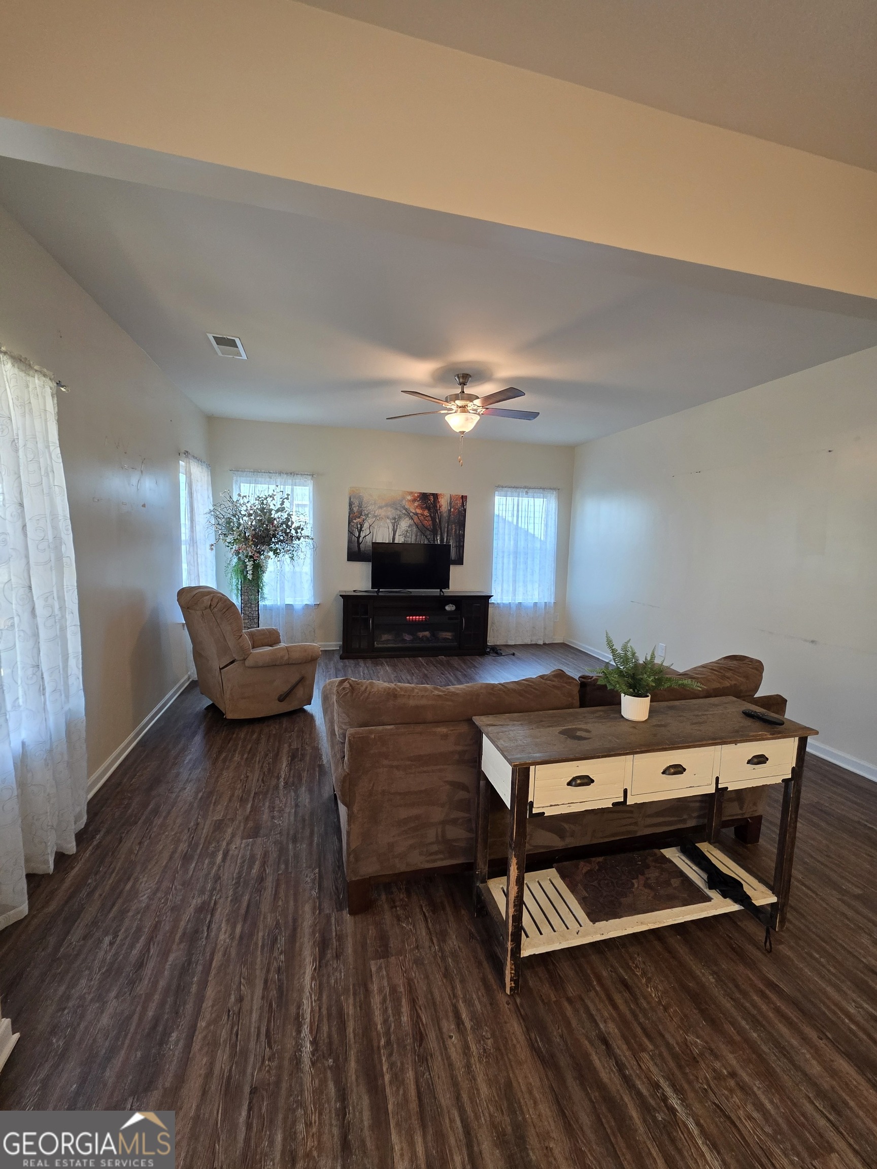 28 Thacker Trail Adairsville, GA 30103 - Photo 11 of 14 a living room with furniture and a wooden floor
