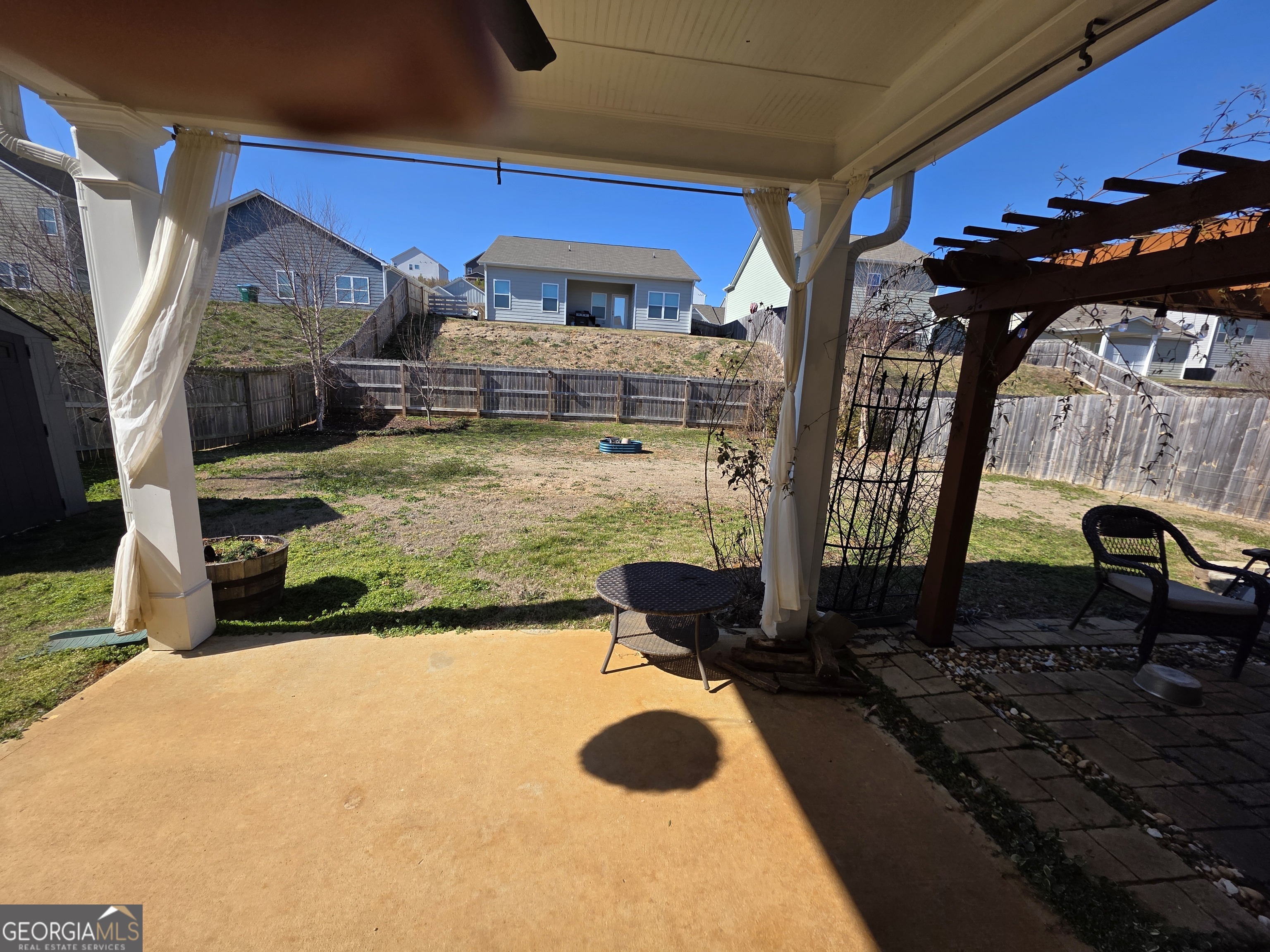 28 Thacker Trail Adairsville, GA 30103 - Photo 13 of 14 a view of a house with backyard and sitting area