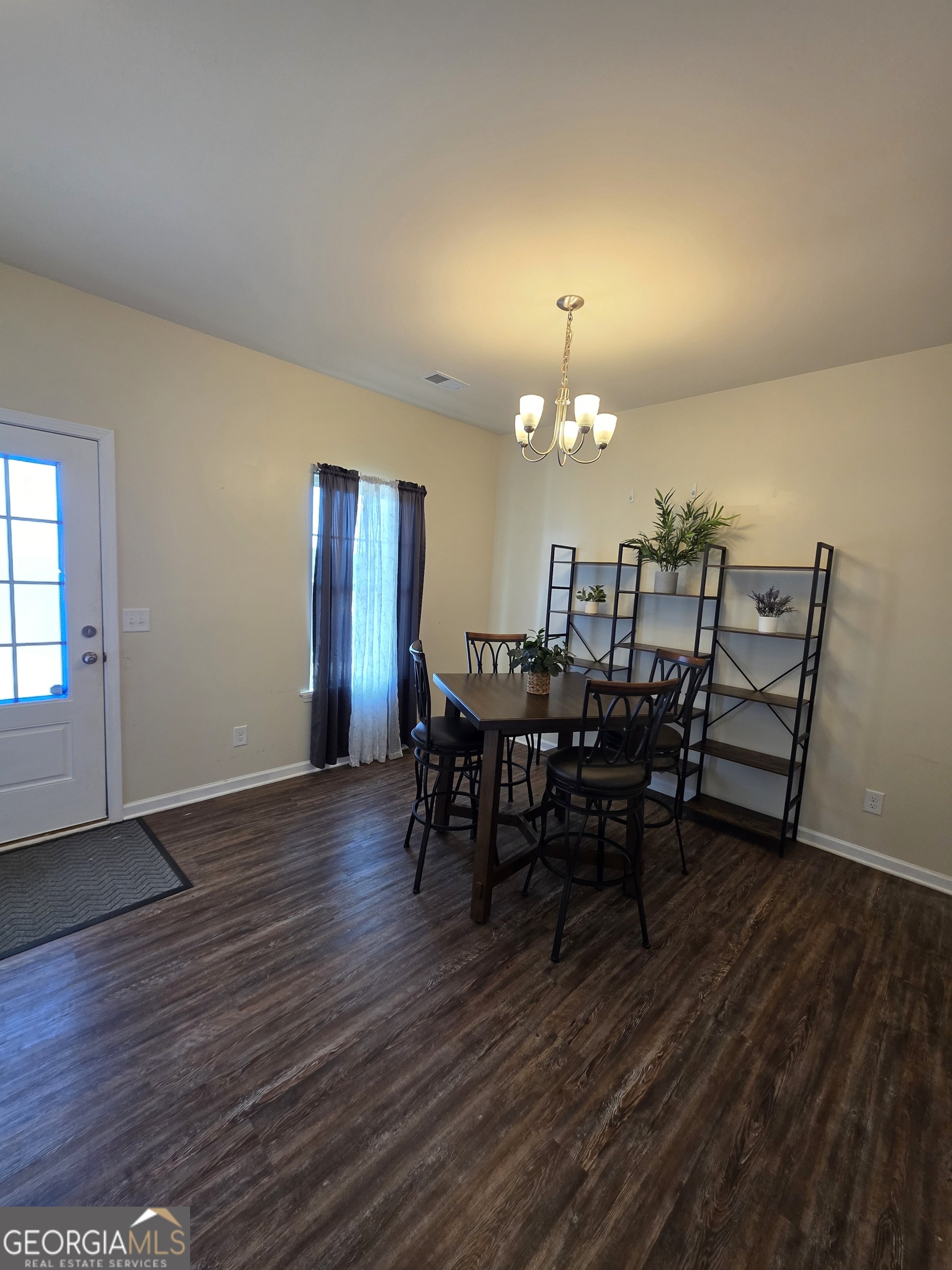 28 Thacker Trail Adairsville, GA 30103 - Photo 2 of 14 a view of a dining room with furniture and wooden floor