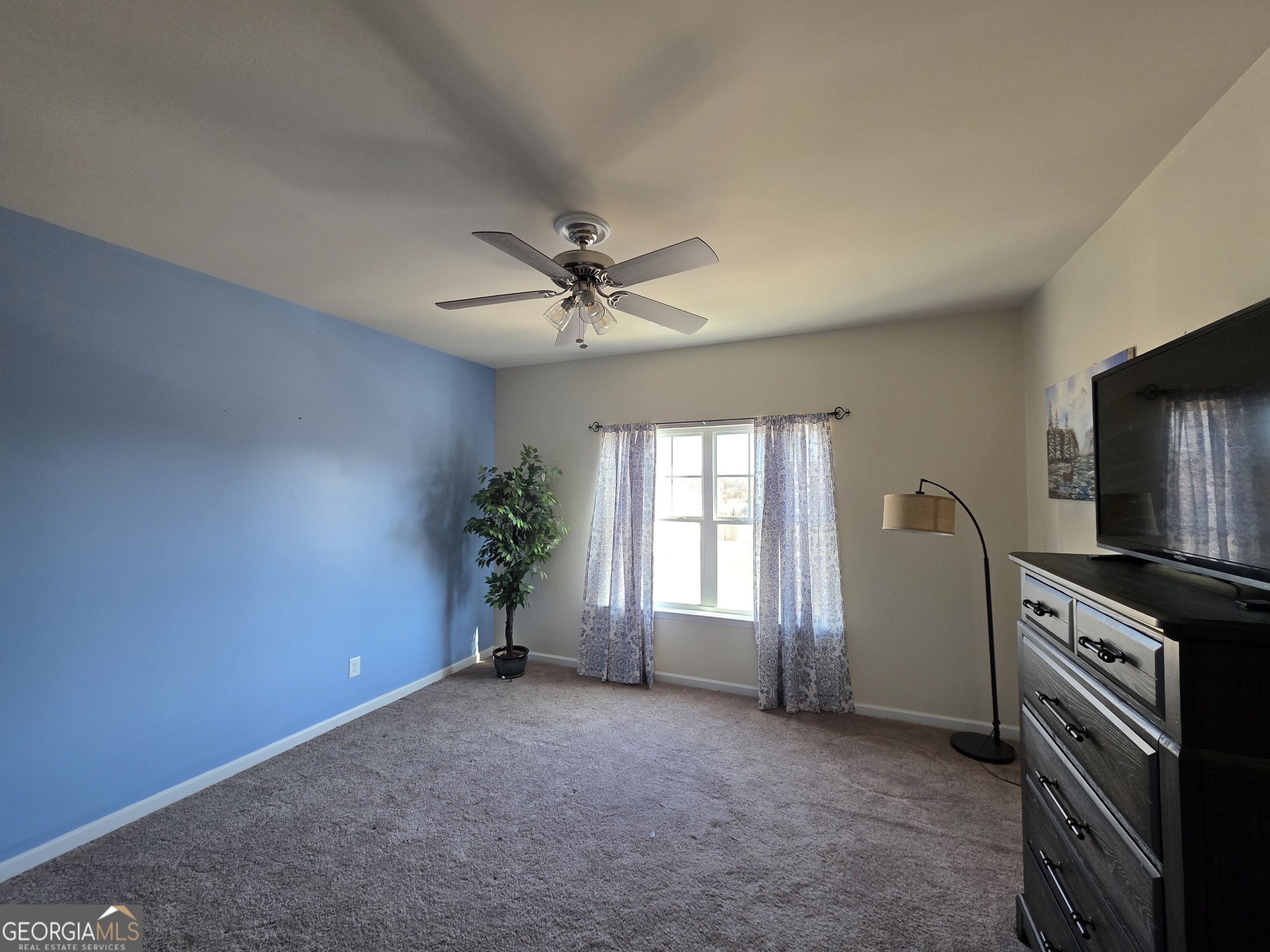 28 Thacker Trail Adairsville, GA 30103 - Photo 6 of 14 a view of a kitchen with a stove cabinets and a window