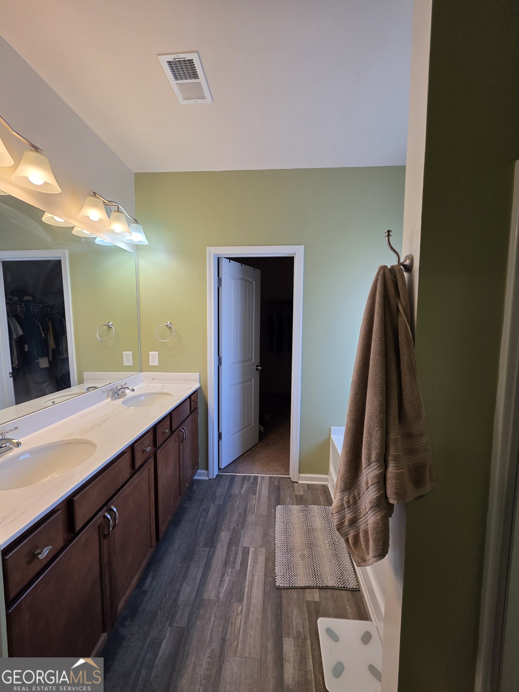 28 Thacker Trail Adairsville, GA 30103 - Photo 8 of 14 a spacious bathroom with a sink and a mirror