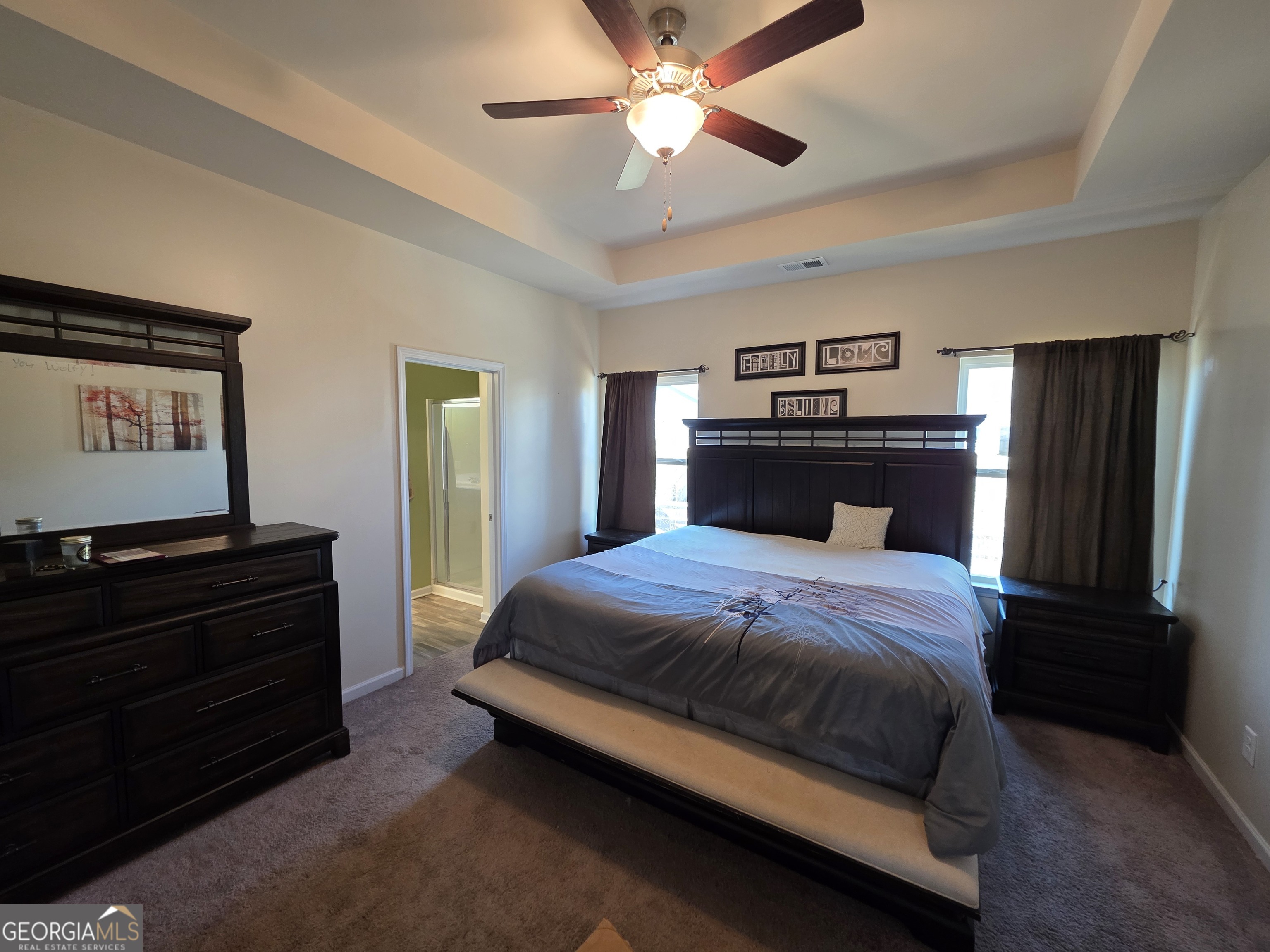 28 Thacker Trail Adairsville, GA 30103 - Photo 10 of 14 a bedroom with a bed and a dresser