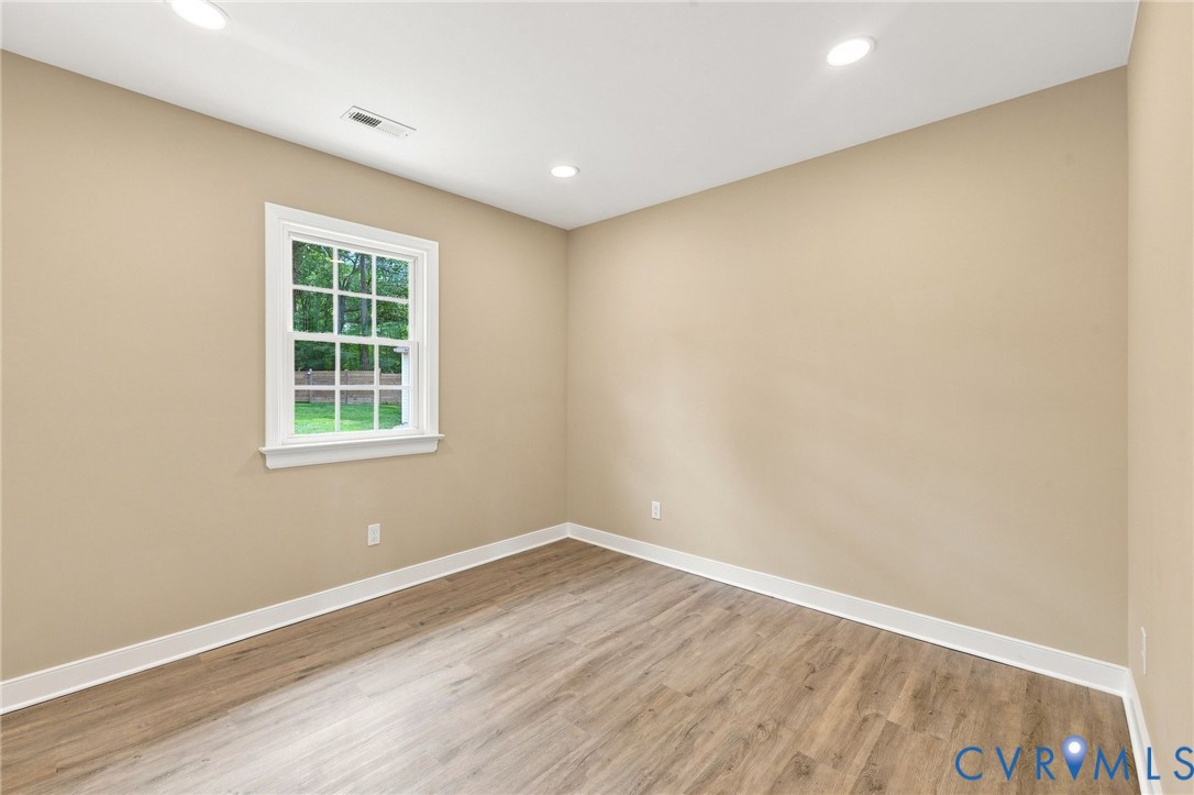3221 Clintwood Road Midlothian, VA 23112 - Photo 34 of 46 Neutral wall paint, wood-finish flooring, white wi