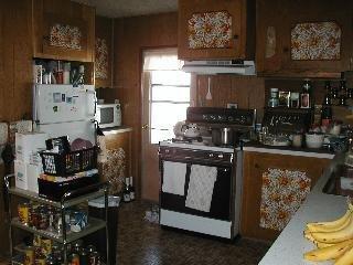 159 Redwing Drive Santa Rosa, CA 95409 - Photo 2 of 3 a kitchen with stainless steel appliances granite countertop a stove and a refrigerator