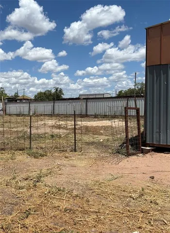 a view of a pathway with a lake