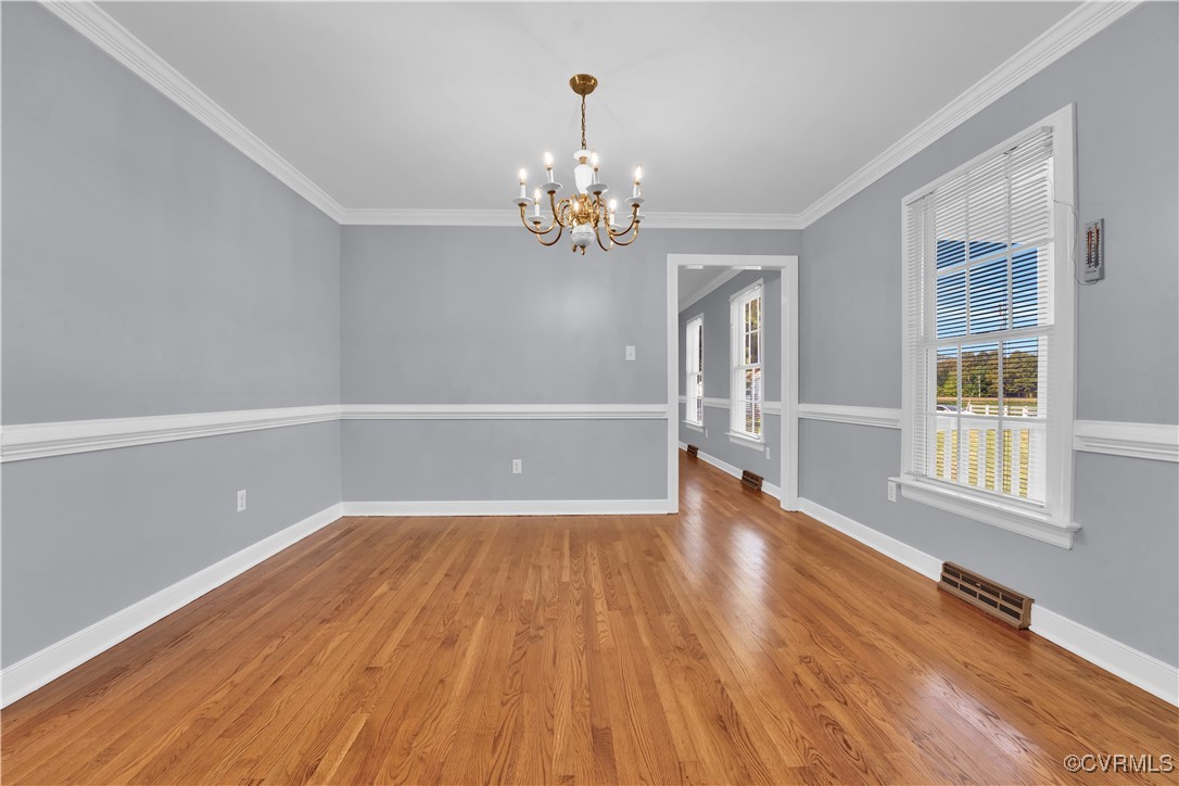 5285 Sandy Valley Road Mechanicsville, VA 23111 - Photo 11 of 37 wooden floor in an empty room with a window