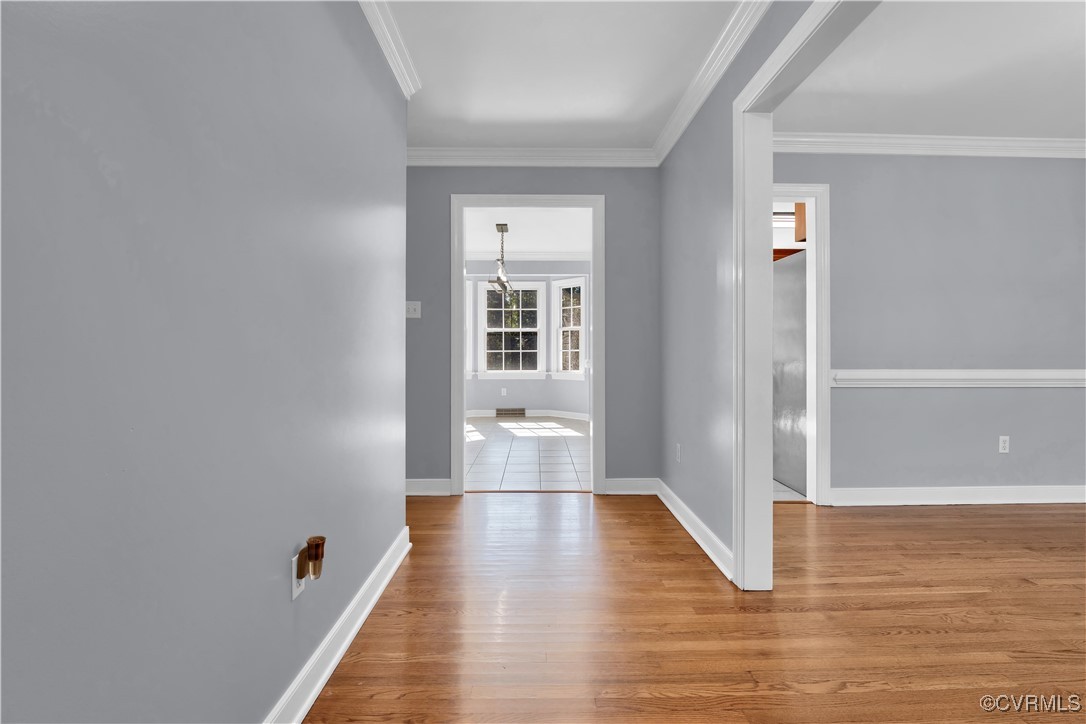5285 Sandy Valley Road Mechanicsville, VA 23111 - Photo 13 of 37 a view of a hallway with wooden floor