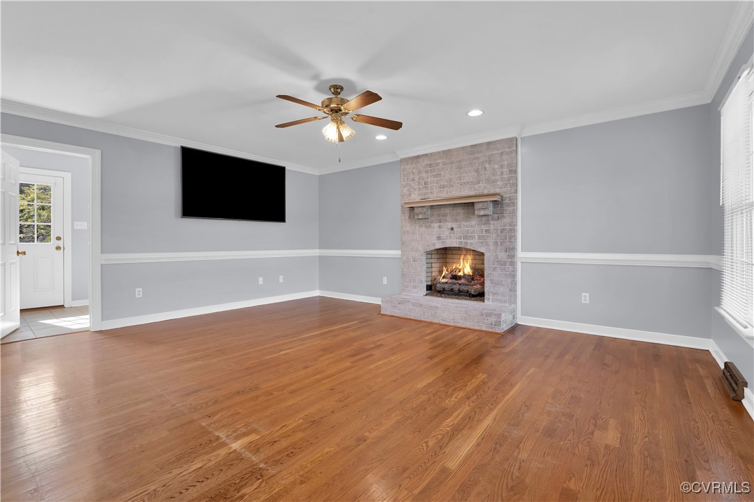 5285 Sandy Valley Road Mechanicsville, VA 23111 - Photo 14 of 37 a living room with furniture and a flat screen tv