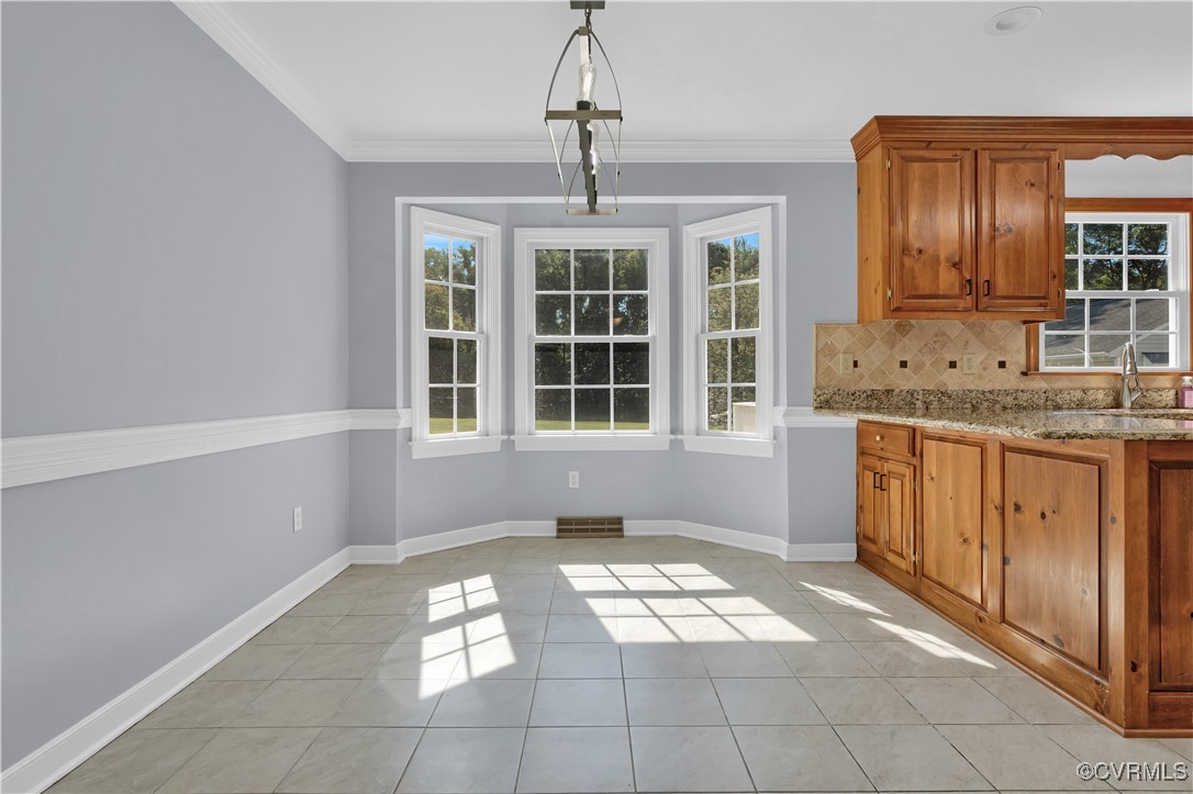 5285 Sandy Valley Road Mechanicsville, VA 23111 - Photo 21 of 37 a view of a kitchen with windows