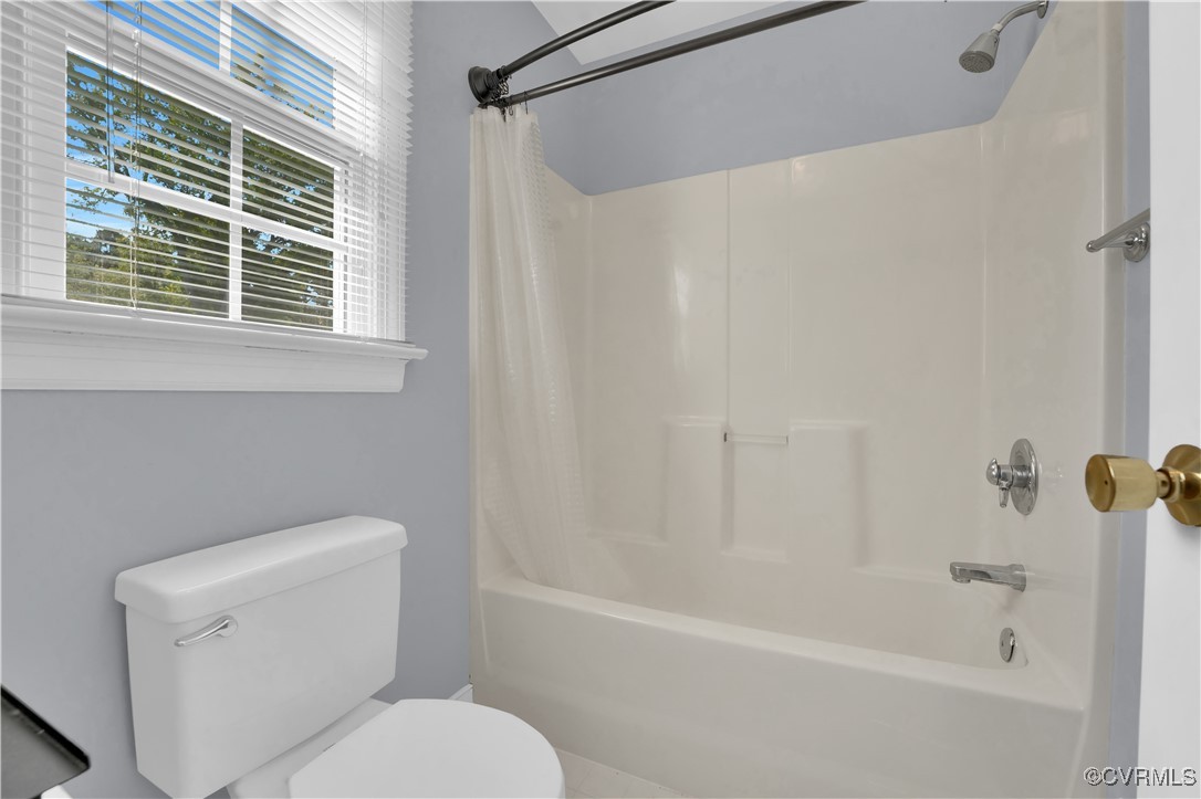 5285 Sandy Valley Road Mechanicsville, VA 23111 - Photo 26 of 37 a white toilet sitting next to a bath tub shower