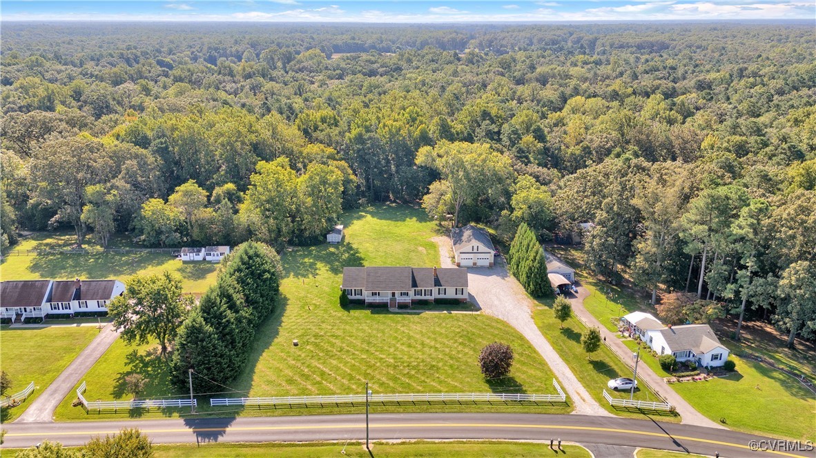 5285 Sandy Valley Road Mechanicsville, VA 23111 - Photo 3 of 37 a view of swimming pool with a garden and seating area