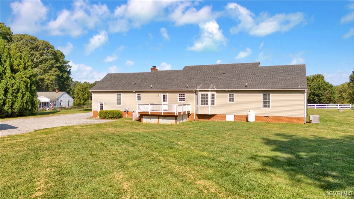 5285 Sandy Valley Road Mechanicsville, VA 23111 - Photo 6 of 37 a house view with swimming pool and trees in the background