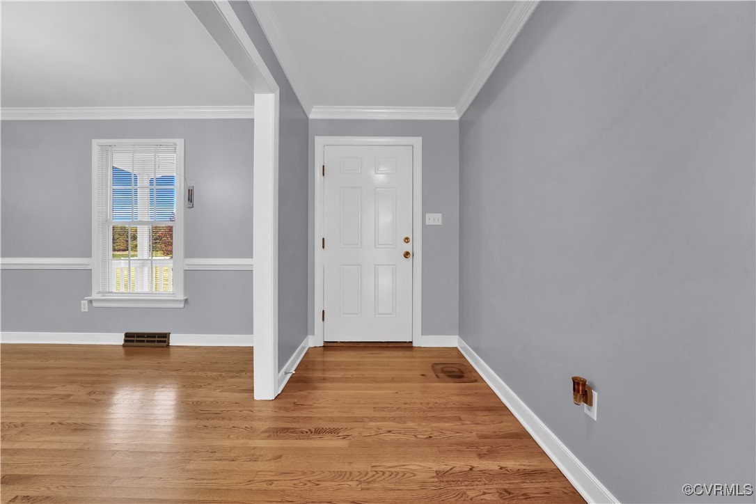 5285 Sandy Valley Road Mechanicsville, VA 23111 - Photo 10 of 37 wooden floor in an empty room with a window