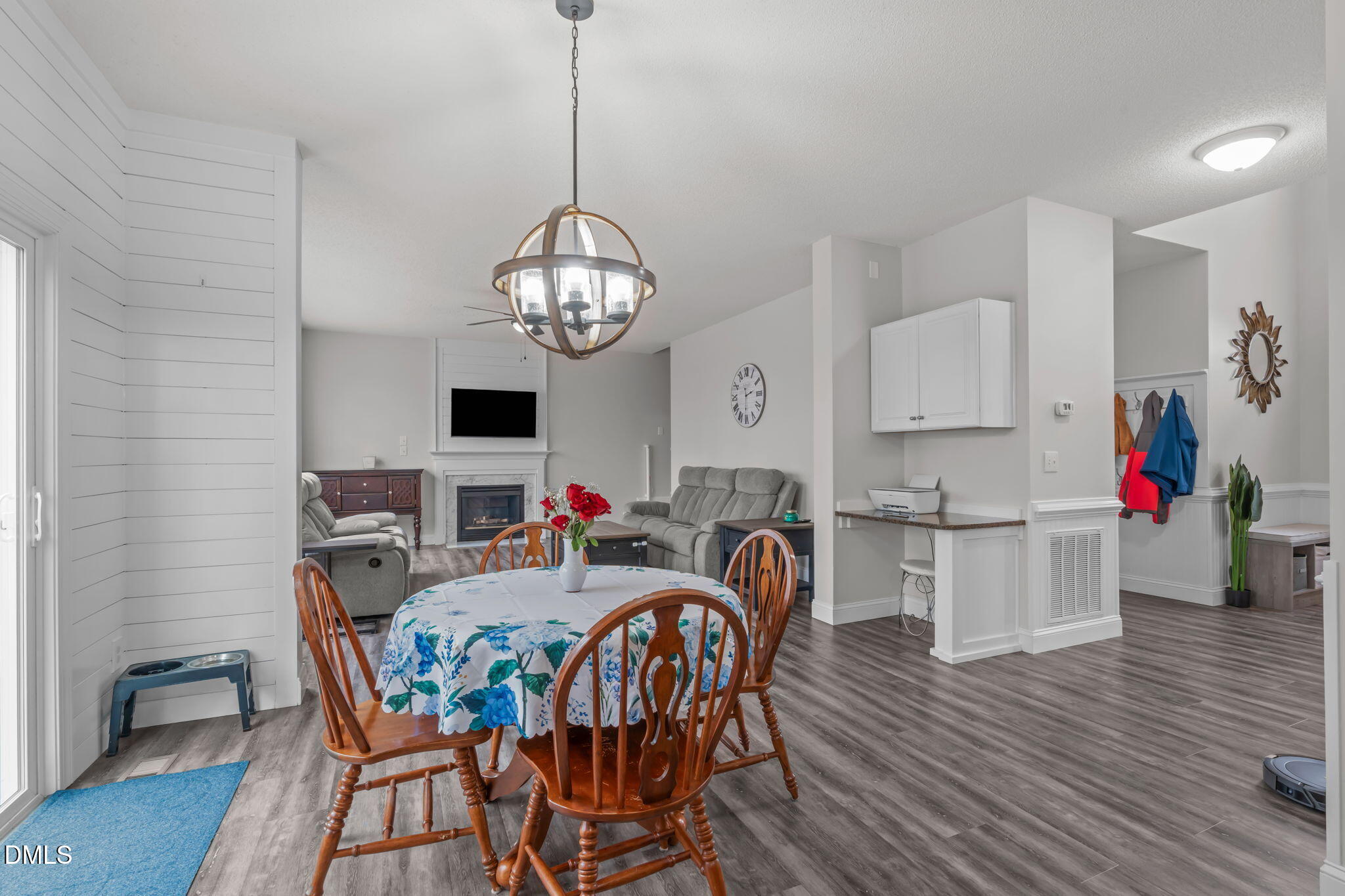 2501 Springfield Park Drive Raleigh, NC 27614 - Photo 16 of 44 a view of a dining room with furniture wooden floor and chandelier