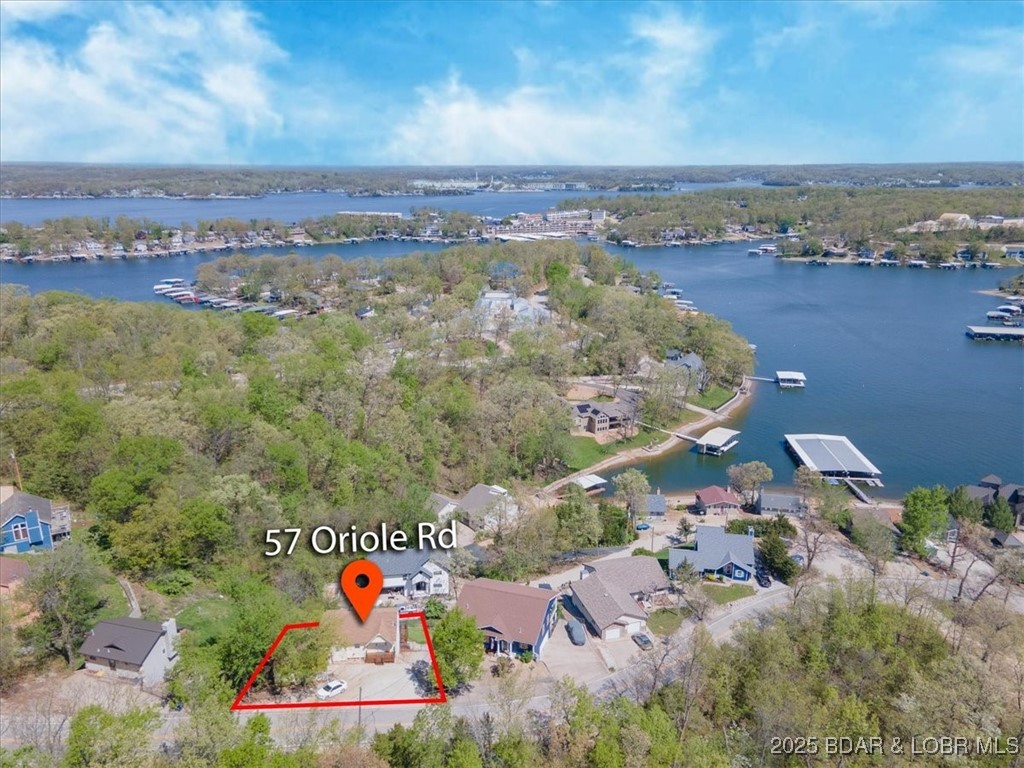 57 Oriole Road Lake Ozark, MO 65049 - Photo 4 of 41 Drone view showing proximaty to lake and the commu