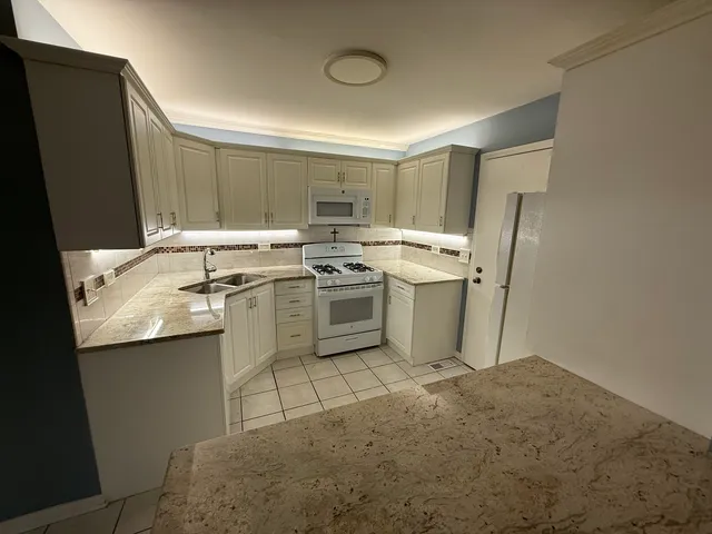 a utility room with washer and dryer