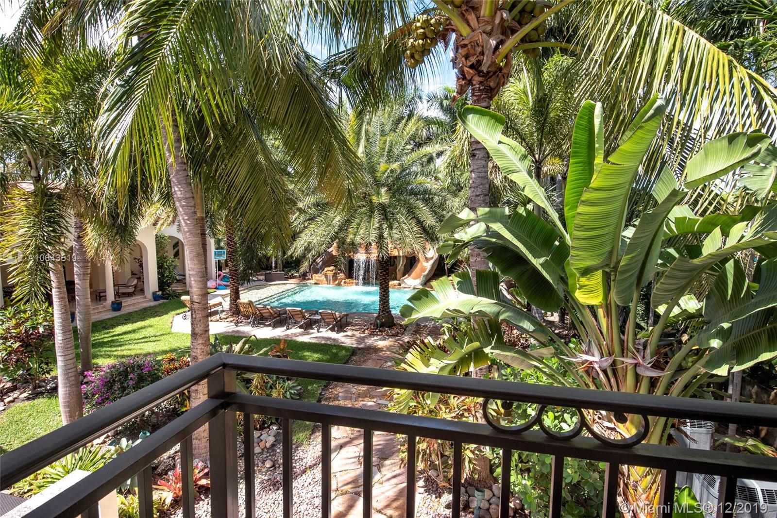 3400 Pine Tree Drive Miami Beach, FL 33140 - Photo 52 of 52 View of Backyard from Guest House Balcony