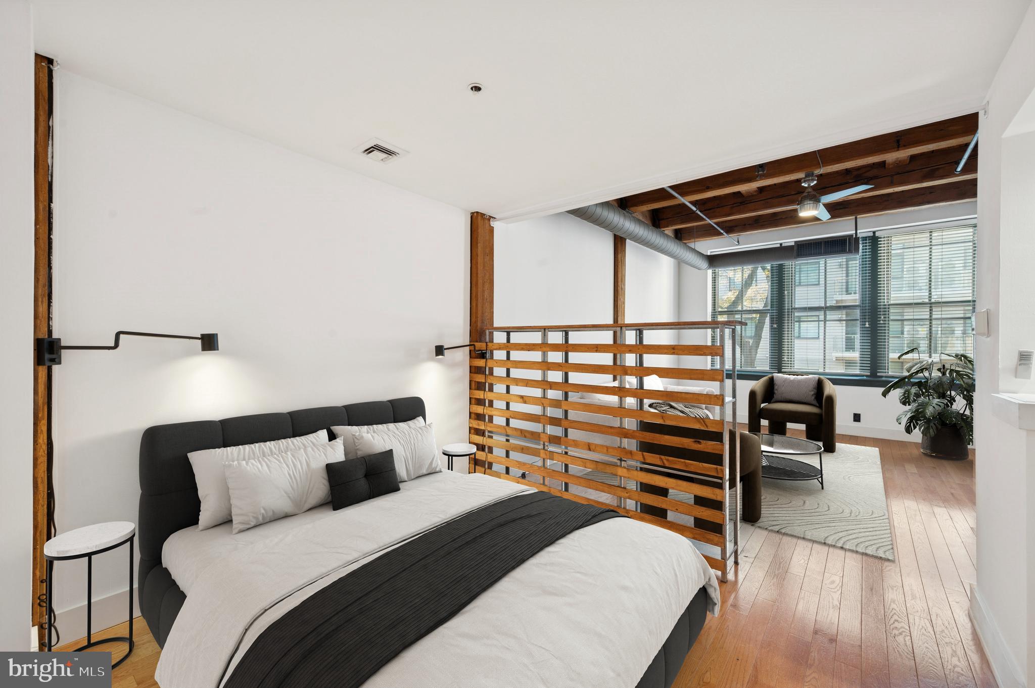 301 Race Street, Unit 308 Philadelphia, PA 19106 - Photo 2 of 17 a bedroom with a bed and a walk in closet