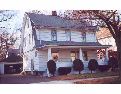 50 Brunswick Street Springfield, MA 01108 - Photo 1 of 1 a front view of house with a garden