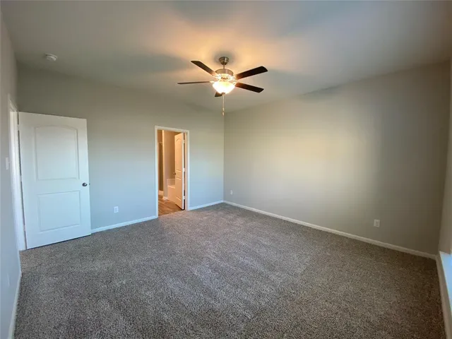 a bathroom with a sink toilet and a mirror
